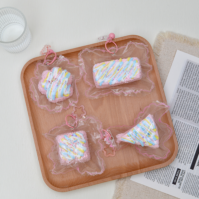 Squishy de pastel de crema con espolvoreados de colores